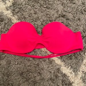 Neon Pink strapless swimsuit top.
